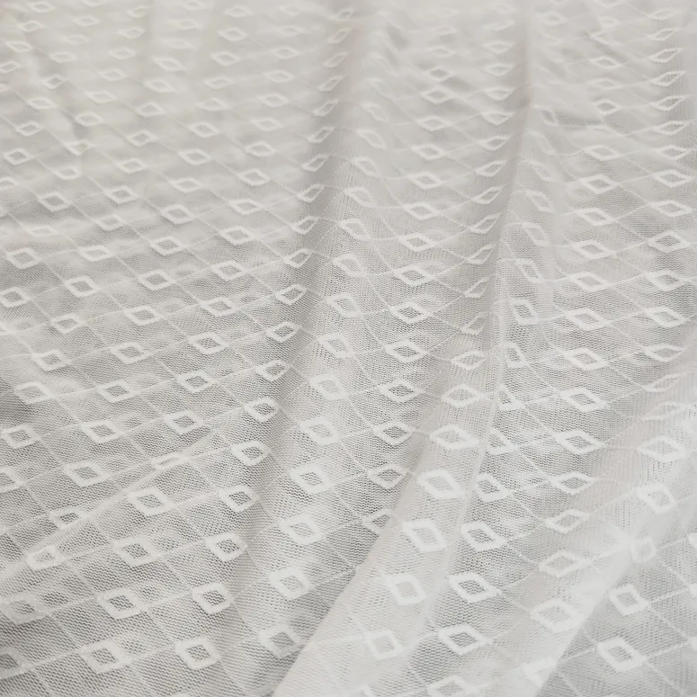 نمونه پارچه حریر طرحدار سفید-دختران طلایی